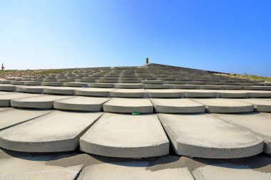 Nanliao Stairway, a chunky, fish-scale stone steps to the water at Xingang Rd, Hsinchu, Taiwan clipart