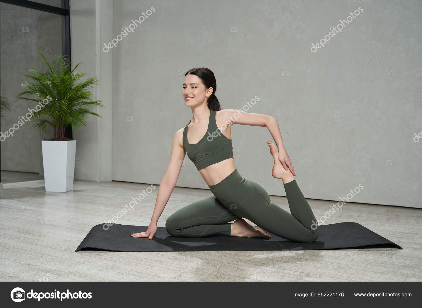 Side View Attractive Young Female Sitting Barefoot Yoga Mat Stretching  Stock Photo by ©Halyna.bobyk11@gmail.com 652221176