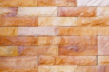 Brick wall background images are used as elements of online advertising.