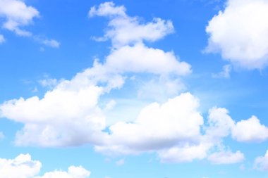 Picture of white clouds bright sky open aura sun shining in gradient.