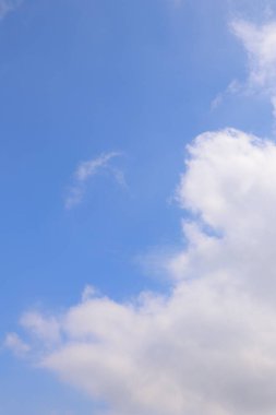 Picture of white clouds bright sky open aura sun shining in gradient.
