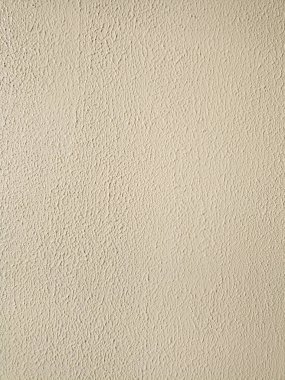 Parlak, parlak, beton duvarlı güzel bir arka plan. İşi için arka plan olarak koydu..