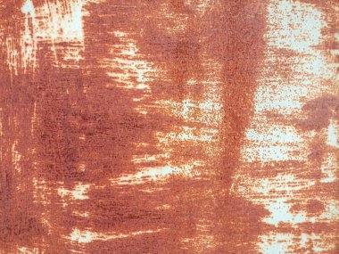 Kullanılmış eski bir galvanizli demir kapıdaki paslı arkaplan resmi, metin için alanı olan güzel bir doğal desendir..