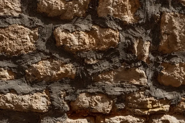 Betondan yapılmış taştan yapılmış gri bir duvarın dokusu
