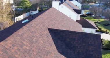 drone roof inspection over residential home