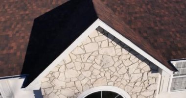 drone roof inspection over residential home