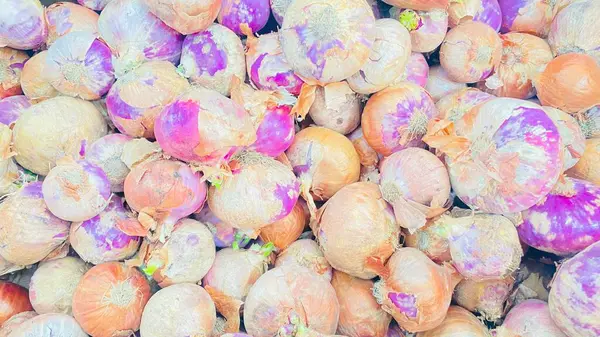 fresh ripe onions in the market