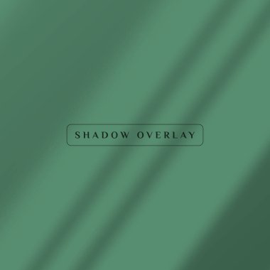 green wall with shadow overlay