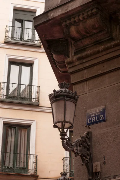 street lamp on a street corner in Madrid, Spain.