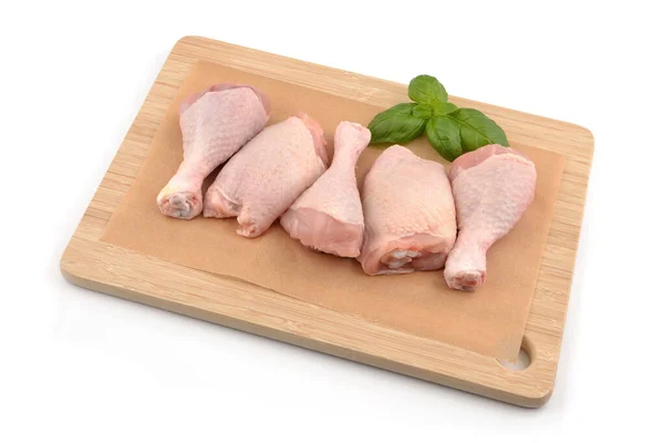 stock image drumstick and chicken thigh on a white background