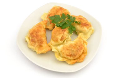fried dumplings with cabbage and meat