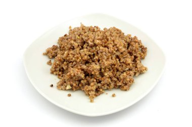 boiled buckwheat on a white background