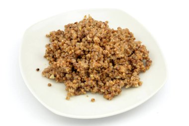 boiled buckwheat on a white background
