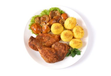 baked chicken meat with potatoes and mushrooms