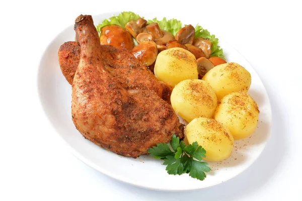 baked chicken meat with potatoes and mushrooms