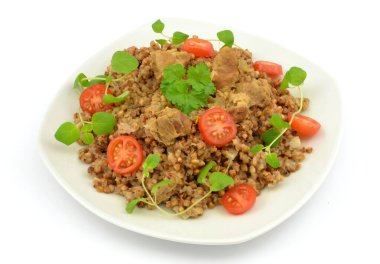 buckwheat with meat on a white background