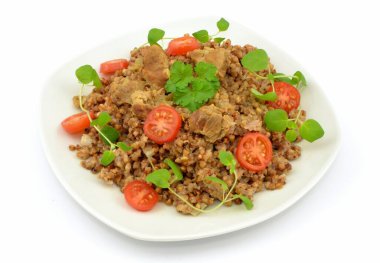 buckwheat with meat on a white background