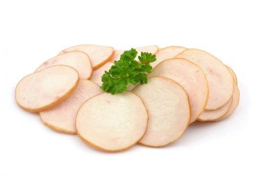 sliced chicken sausage on a white background
