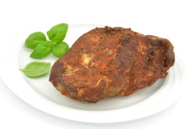 roast pork neck on a plate