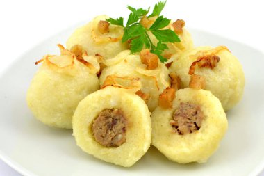 dumplings with meat on a white background