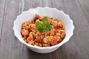 salad with groats, chickpeas and dried tomatoes