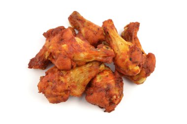 baked chicken wings on a white background
