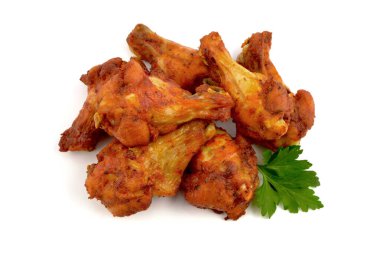 baked chicken wings on a white background