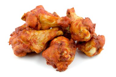 baked chicken wings on a white background