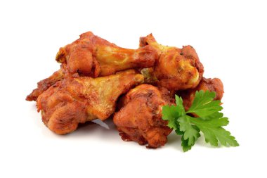 baked chicken wings on a white background