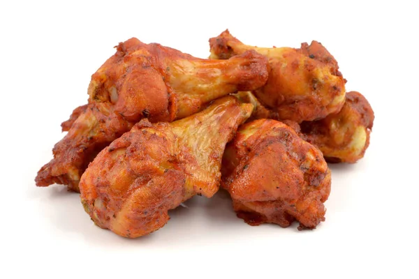 baked chicken wings on a white background