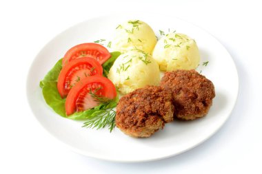 Patates ve domatesli pirzola.