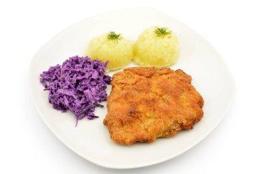 Patates ve salatalı domuz pirzolası.