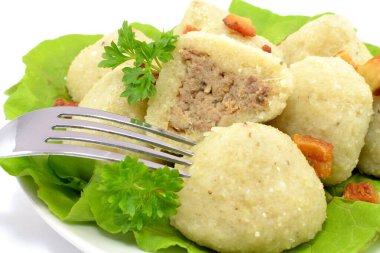 dumplings with meat on a white background