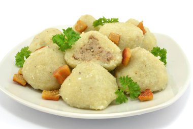 dumplings with meat on a white background