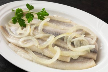 herring marinated in oil with onion