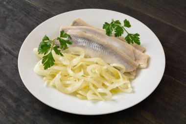 herring marinated in oil with onion