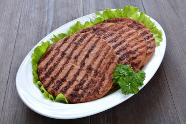 hamburger cutlets on a plate
