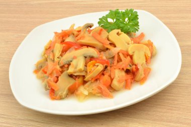 salad with mushrooms on a plate