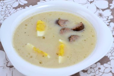 sour rye soup with egg and sausage