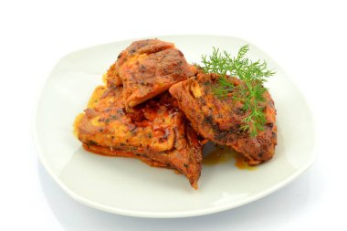 baked ribs on a white background