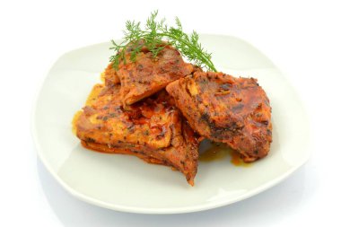 baked ribs on a white background