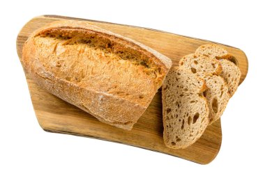 bir kesme tahtası üzerinde ekmek