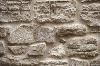 Eski duvar arkaplanının taştan kırsal dokusu