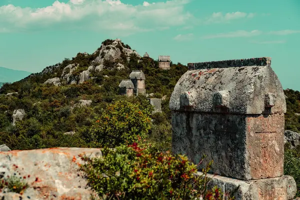 stock image lycian stone tombs, tlos ancient town in kas antalya , turkey, sarcophagus-shaped tomb, only known from Lycia