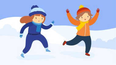 Mutlu çocuklar kışın eğleniyor. 