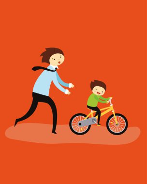 Babası çocuğa bisiklet sürmeyi öğretiyor.