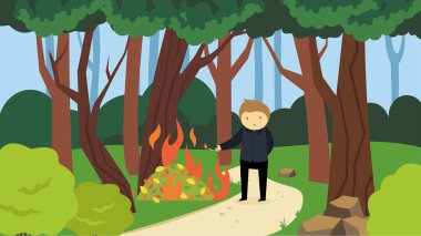 Parkta şenlik ateşi olan bir adam.