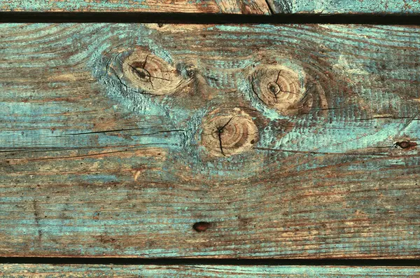 Mavi desenli eski tahta.