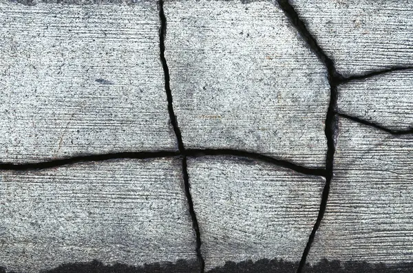 Çatlak gri ahşap yüzey çatlaklar, soyut arkaplan.