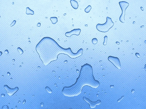 Vattendroppar Järnplattan — Stockfoto